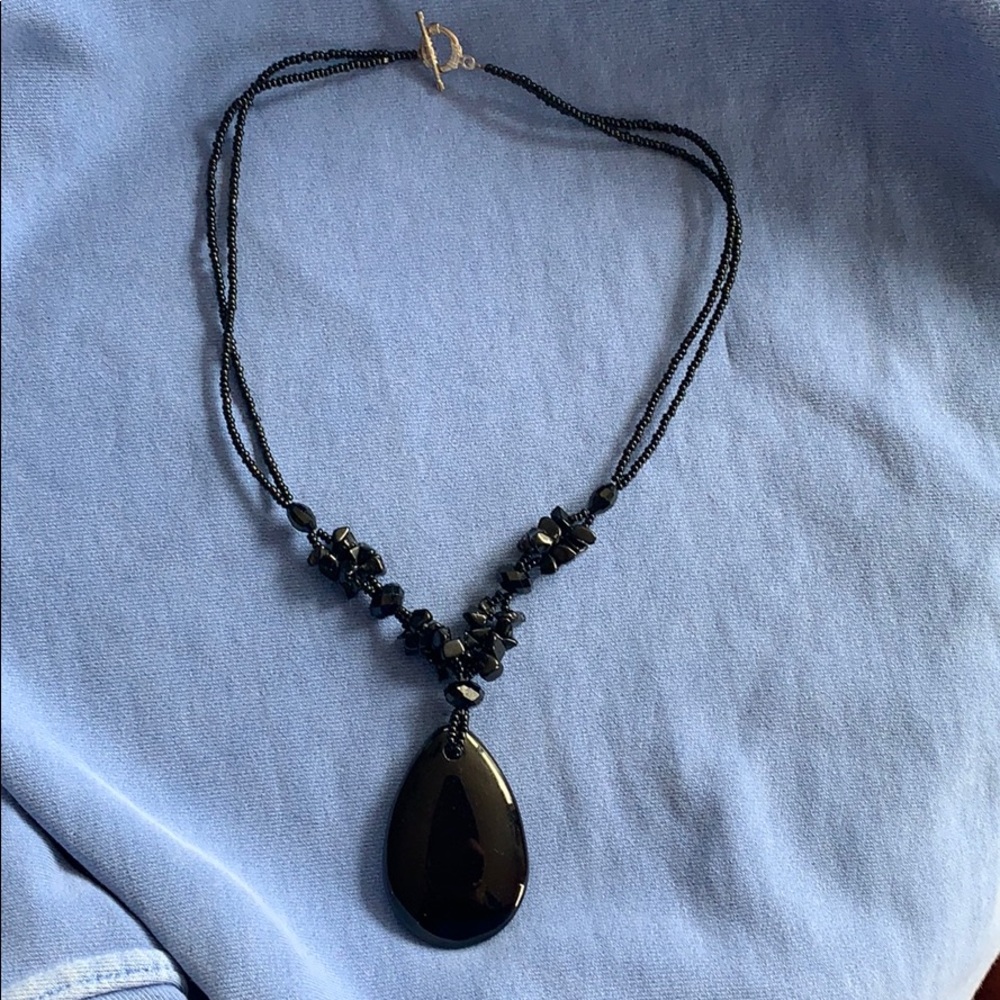 Black beaded pendant necklace